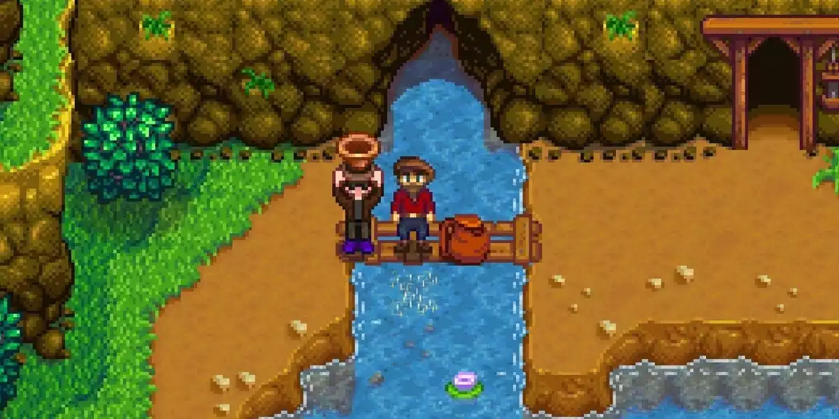 stardew valley player standing next to willy holding copper pan